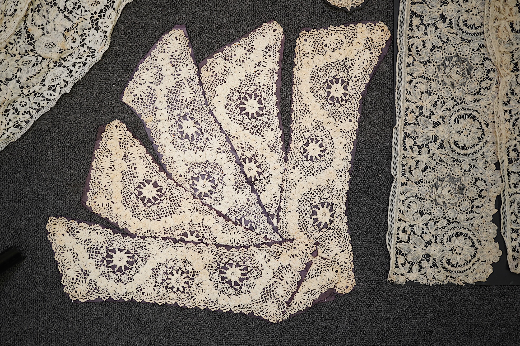 A mixed Brussels bobbin lace and Point de Gaze lace collar, another smaller collar, a similar length of trim and butterfly motif, together with a Brussels bobbin collar and trim, an Irish crochet cuffs, a Valenciennes la